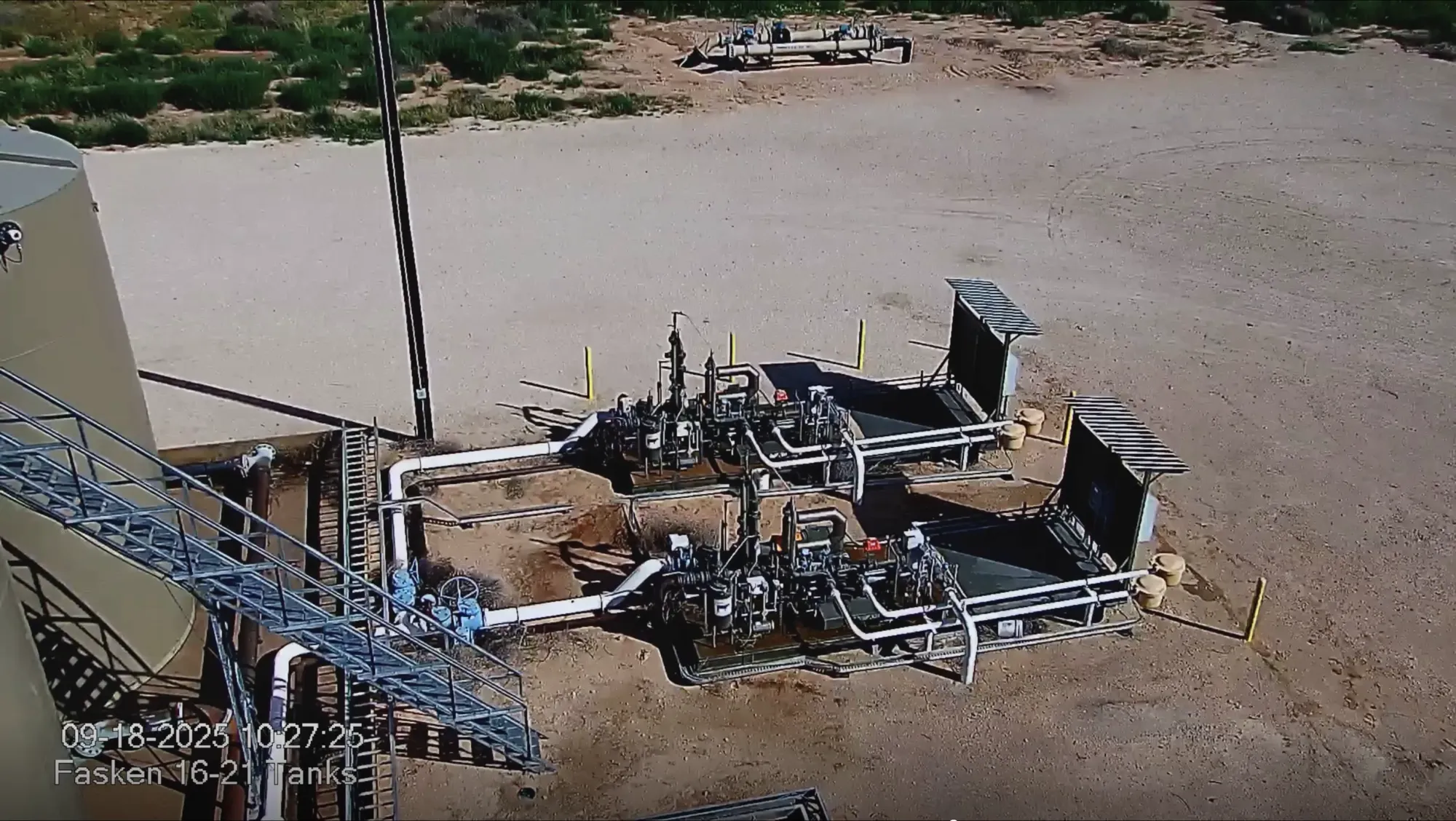 Aerial view of a Permian central tank battery monitored by Twin Eagle Solutions edge-AI cameras